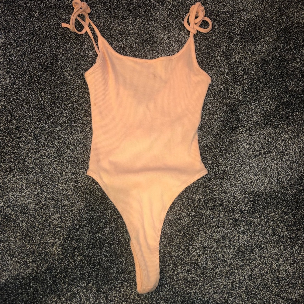 orange bodysuit